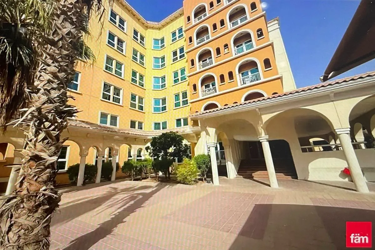 Ritaj courtyard with arched balconies and colonnade