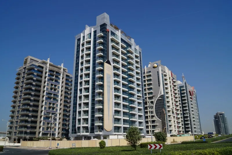 Centurion Residences towers seen from the street, full height