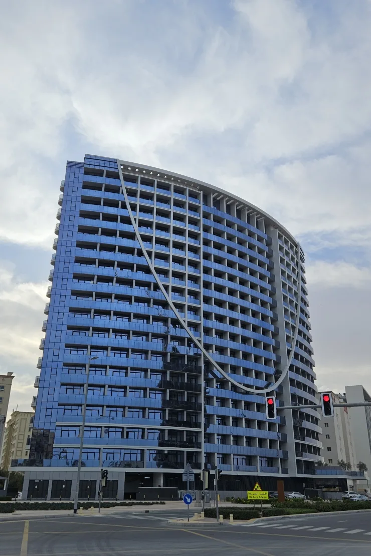 outside, full height, curved front with the V motif (740x1110 portrait)