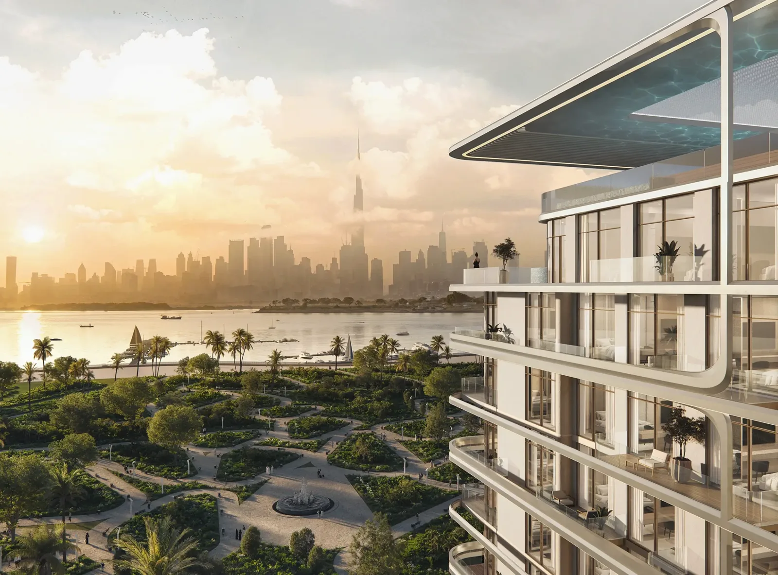 Curved balconies and rooftop pool over park and skyline
