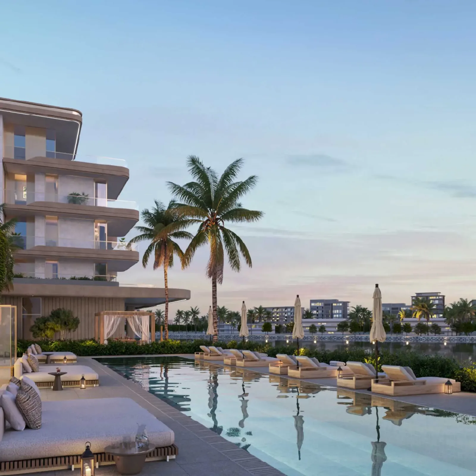 Developer render: pool deck beside terraced residential block at dusk
