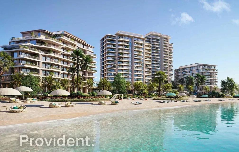 Developer render of towers beside beach lagoon