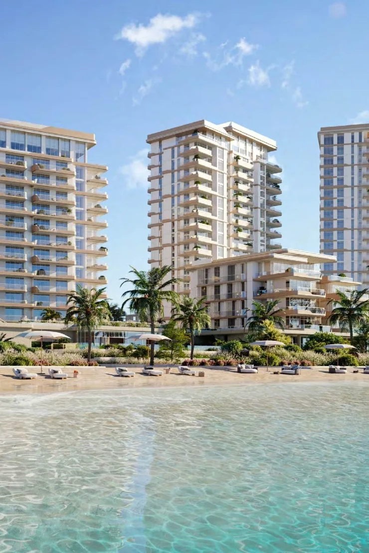 Cream balconied towers above the beach lagoon