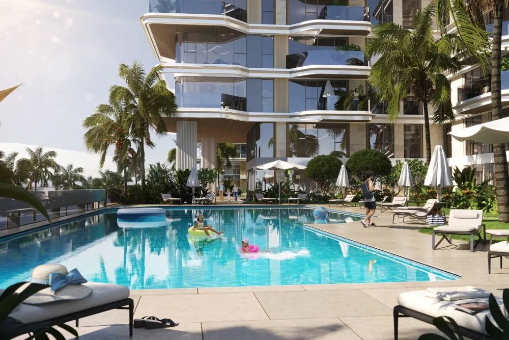 Pool deck beneath curved white balconies