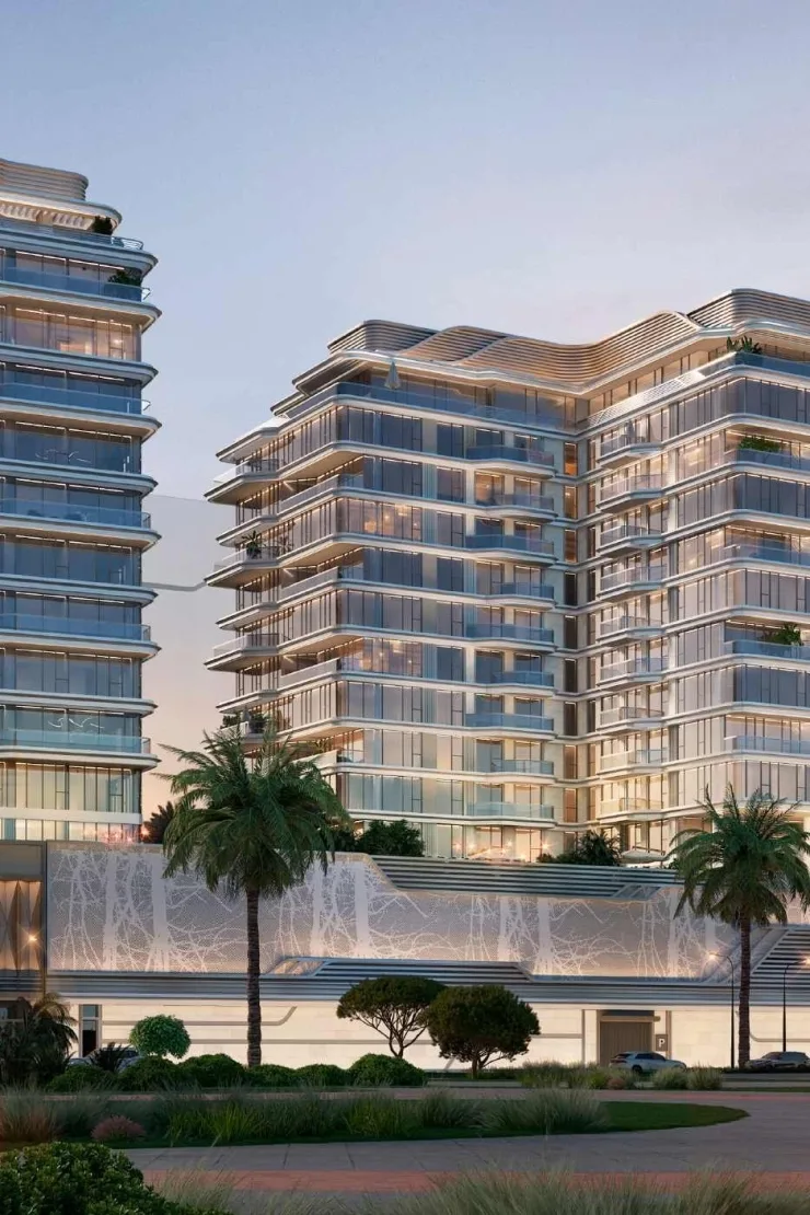 Mid-rise block above white patterned podium wall
