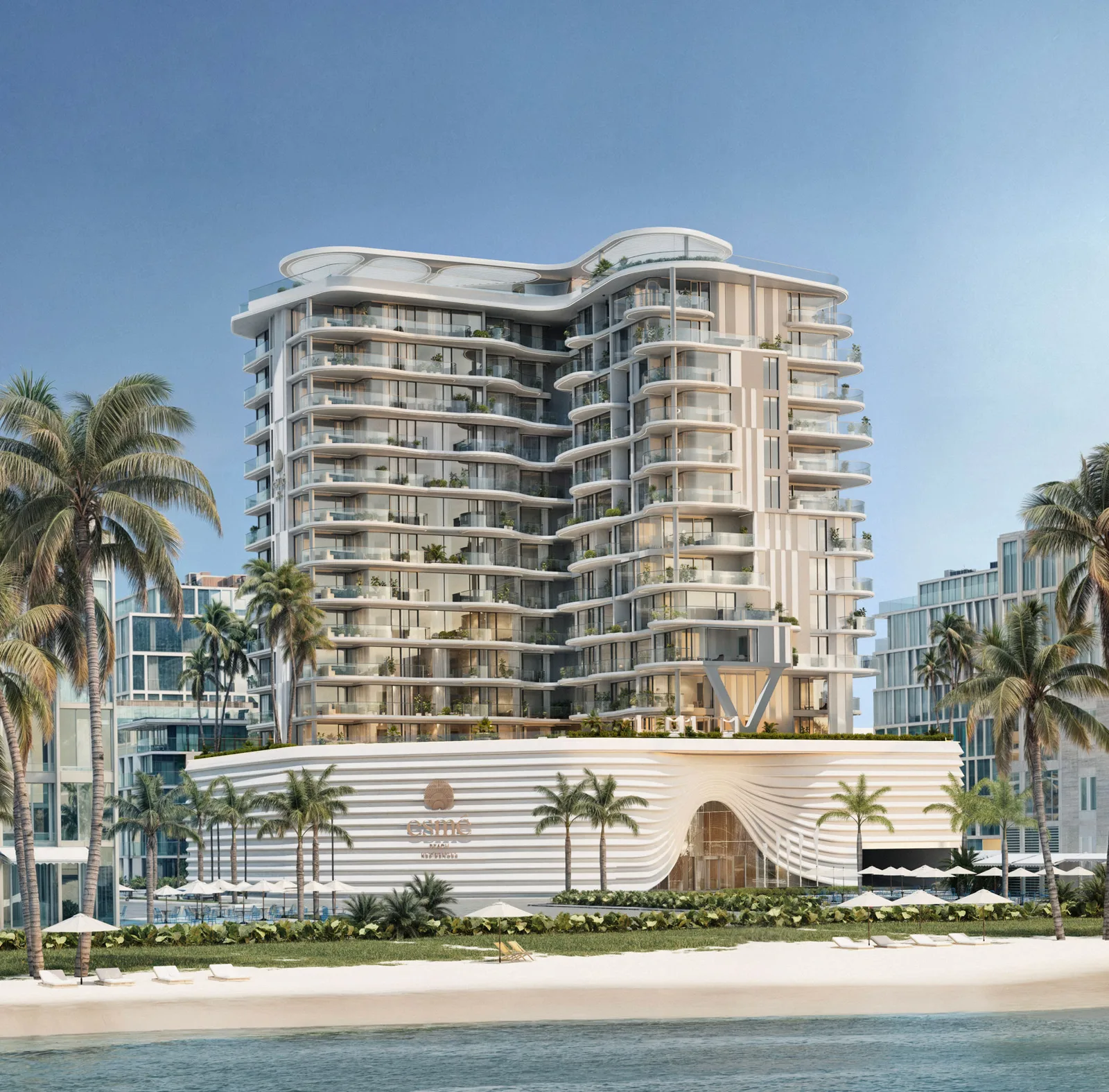Full beachfront facade with curved balconies and esme podium