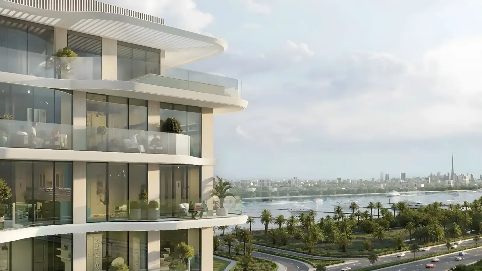 Curved white balconies facing the creek and skyline