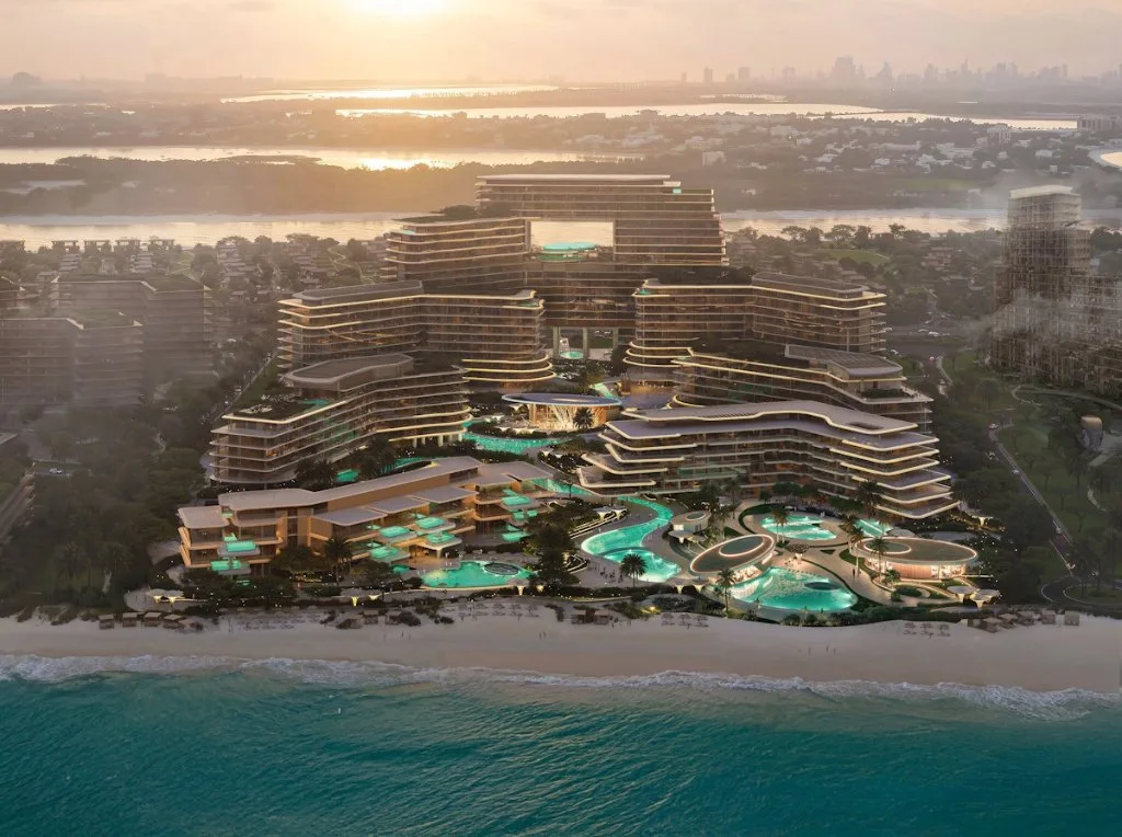 Project picture: Meriva Shores. Beachfront Meriva complex at dusk, aerial render