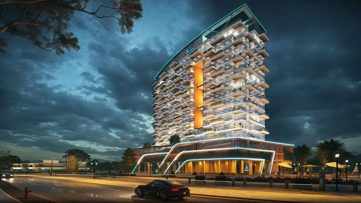 Tower at dusk with lit podium and orange accent