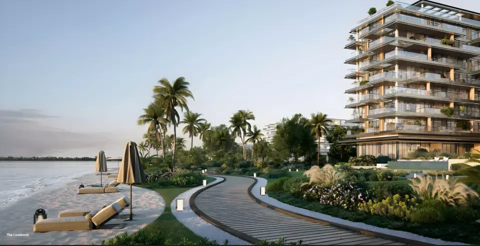 Terraced tower beside beach promenade and loungers