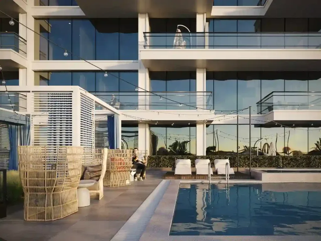 Pool deck with lounge seating below balconies