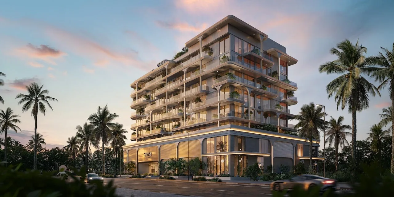 Dusk corner view, cream arched balconies, podium
