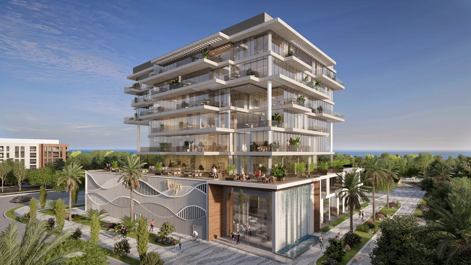 Terraced white building with Vayu-branded podium and water wall