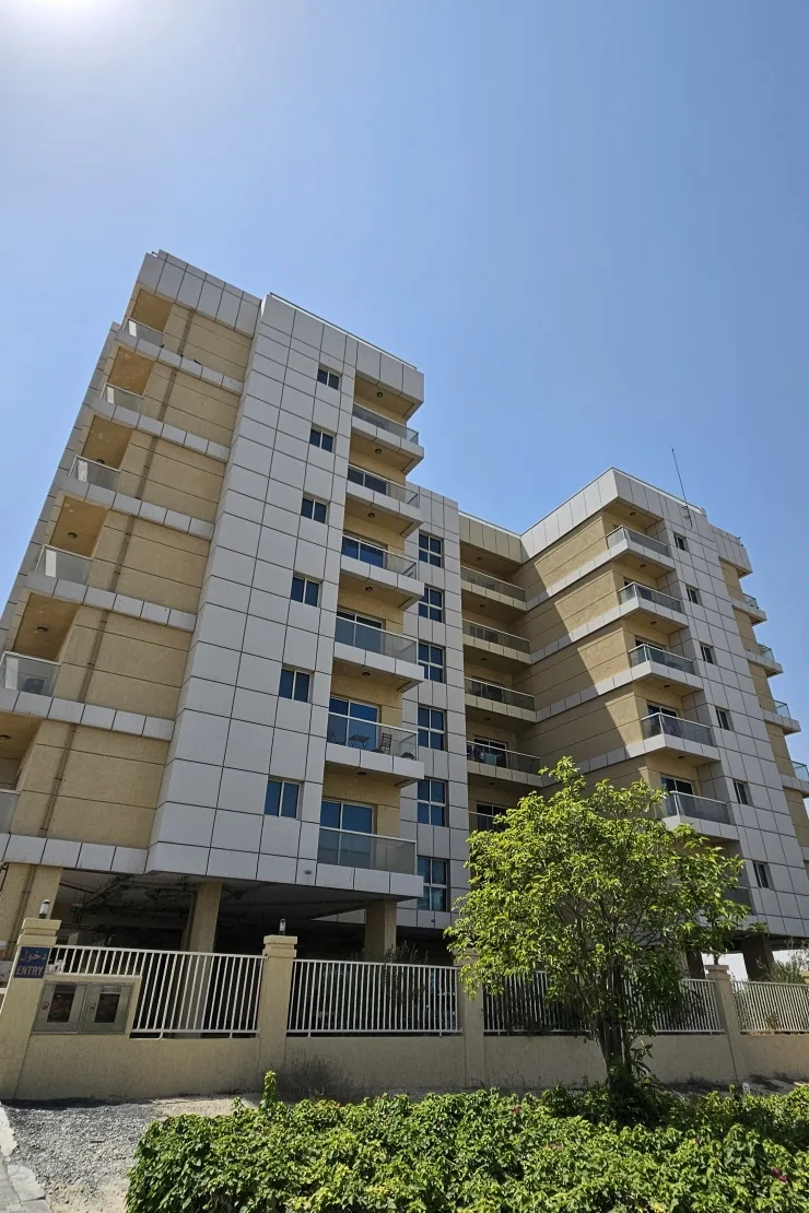 Low-angle exterior view of facade and balconies
