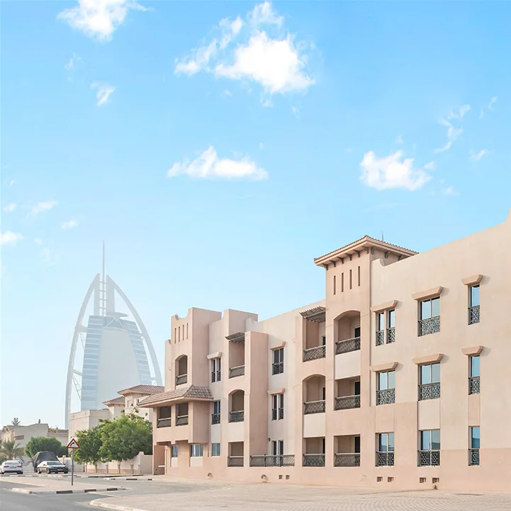 Side facade with balconies, Burj Al Arab behind