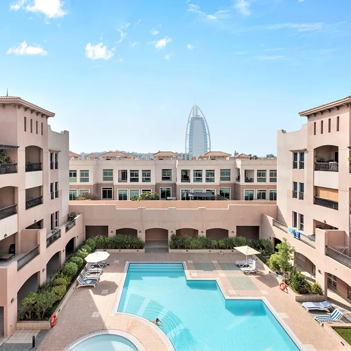 Courtyard pool surrounded by the residence blocks