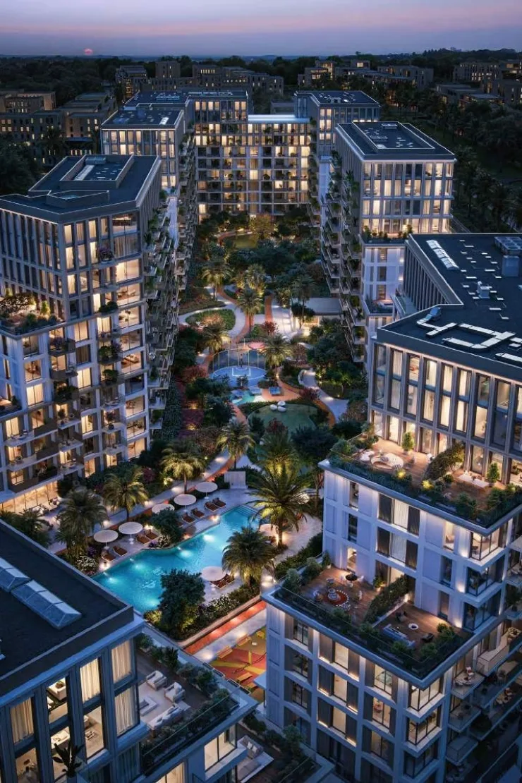 Aerial dusk view of the complex around pool garden
