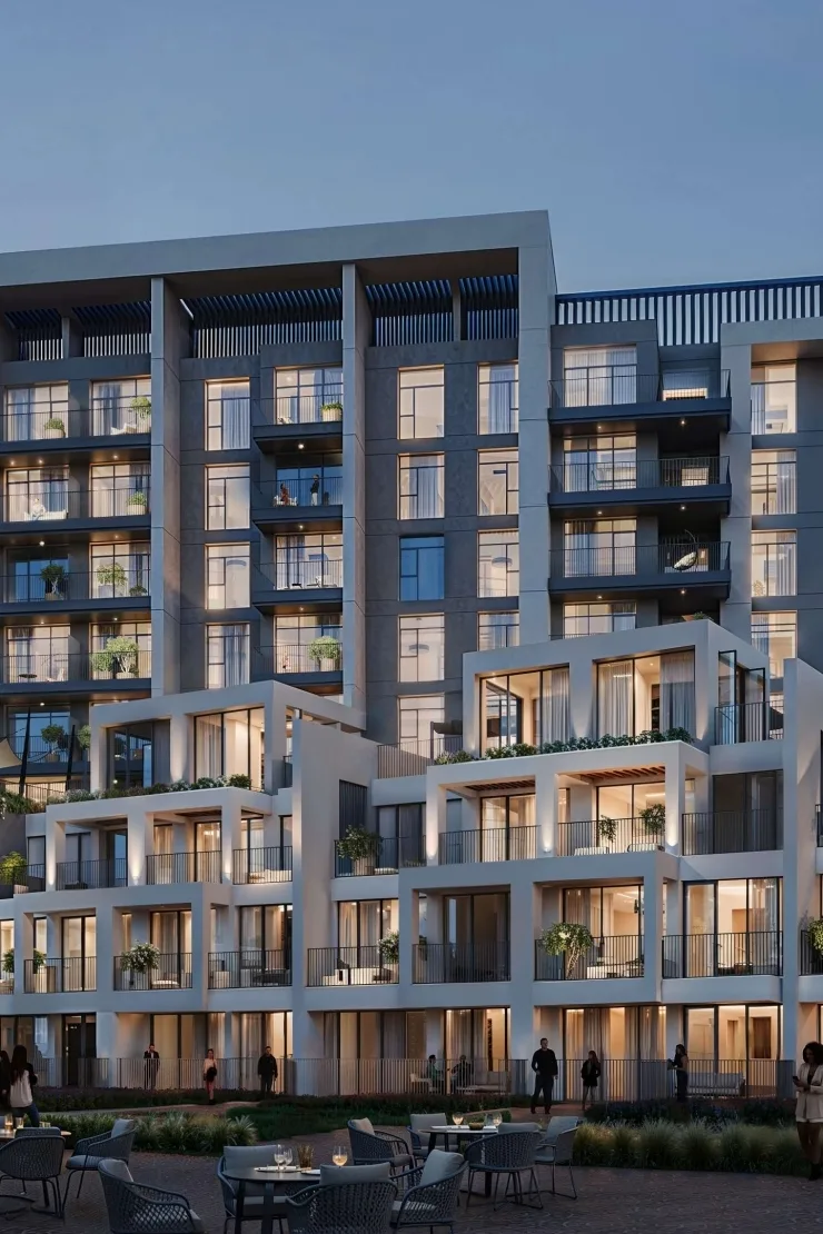 Terraced facade with balconies and courtyard seating