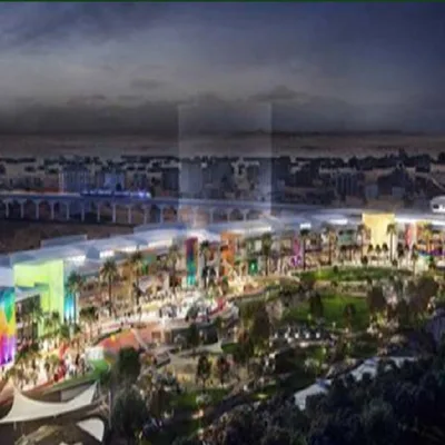 Night aerial render of the mall complex
