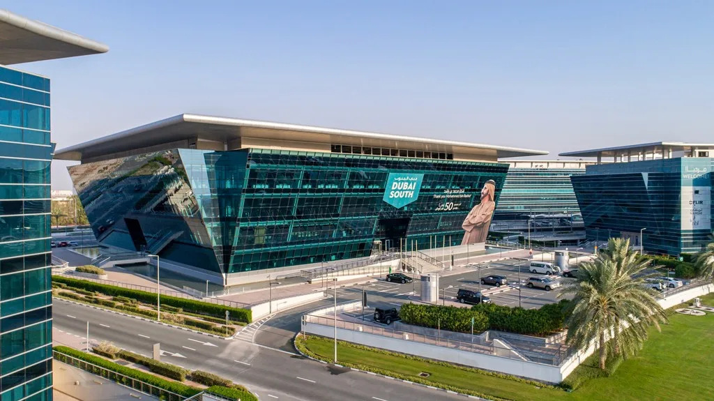 Aerial view of glass HQ with Dubai South signage