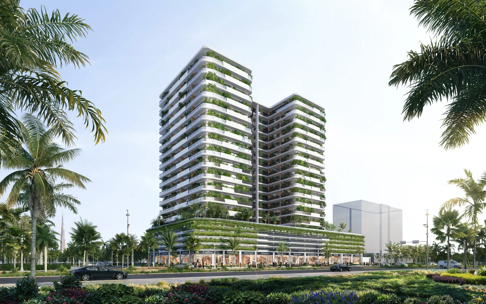 Full tower with green terraces and retail podium