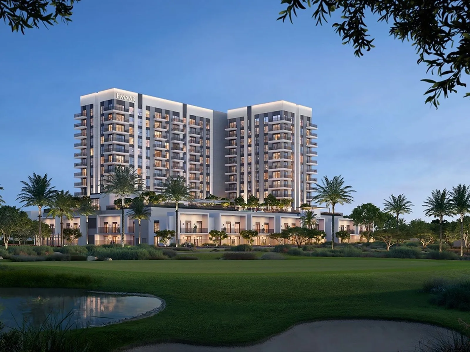 Developer render of twin towers over podium, golf course