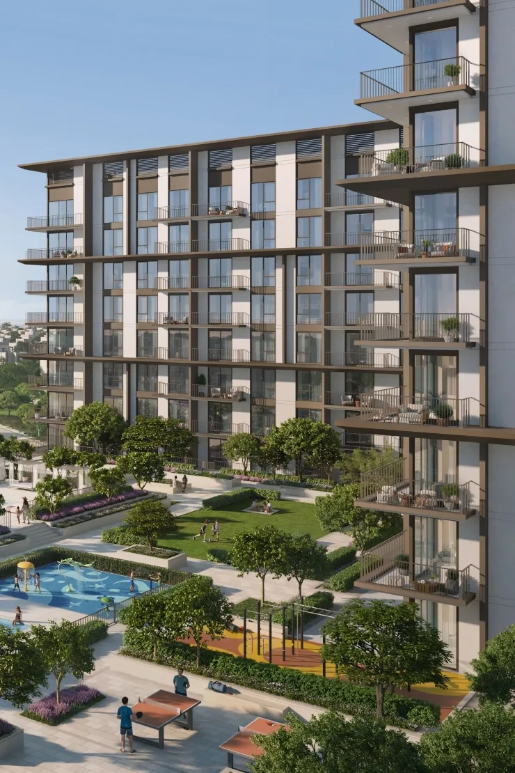 Facade with balconies above pool and lawn