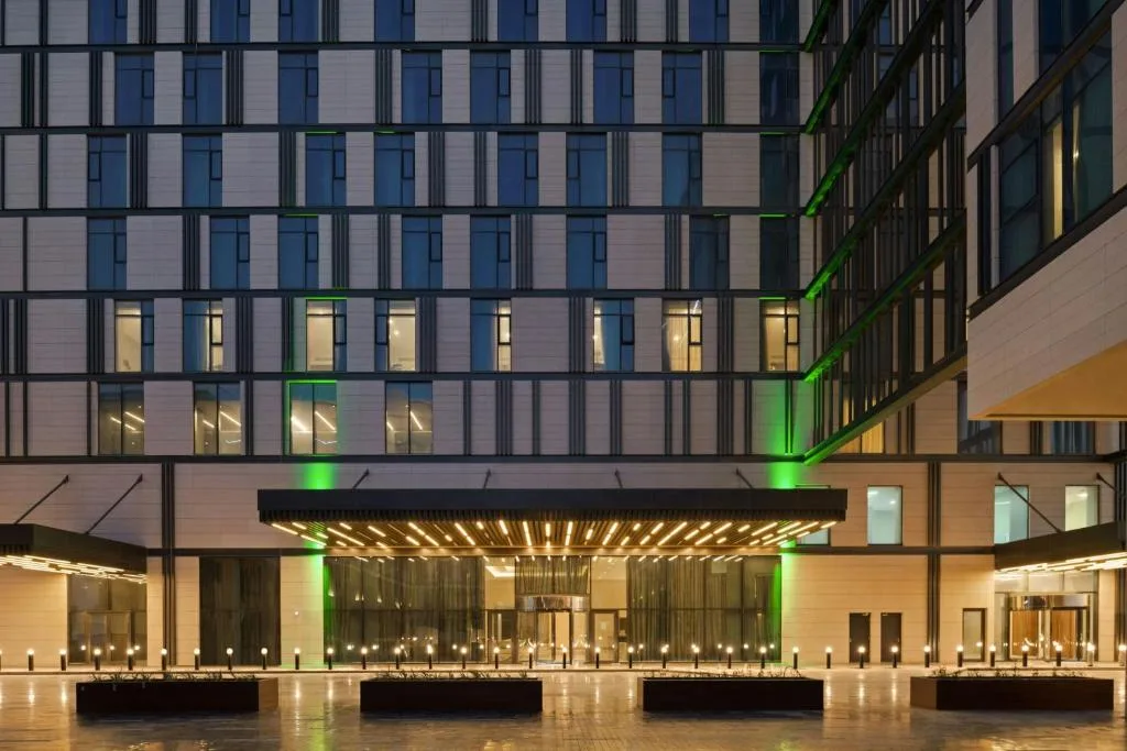 Entrance canopy and facade at night