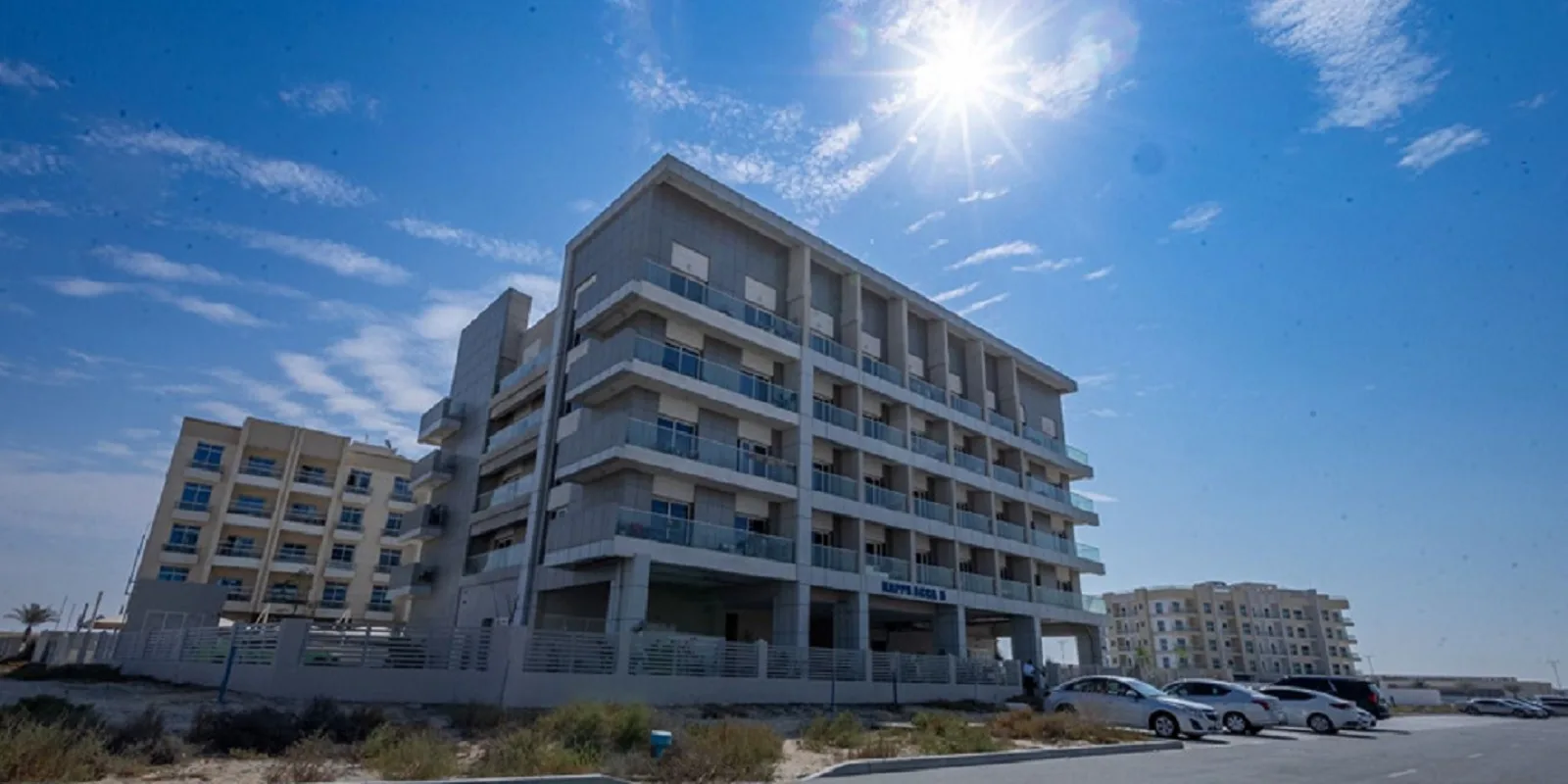 Kappa Acca 5 low-rise exterior with signage, ground to roof