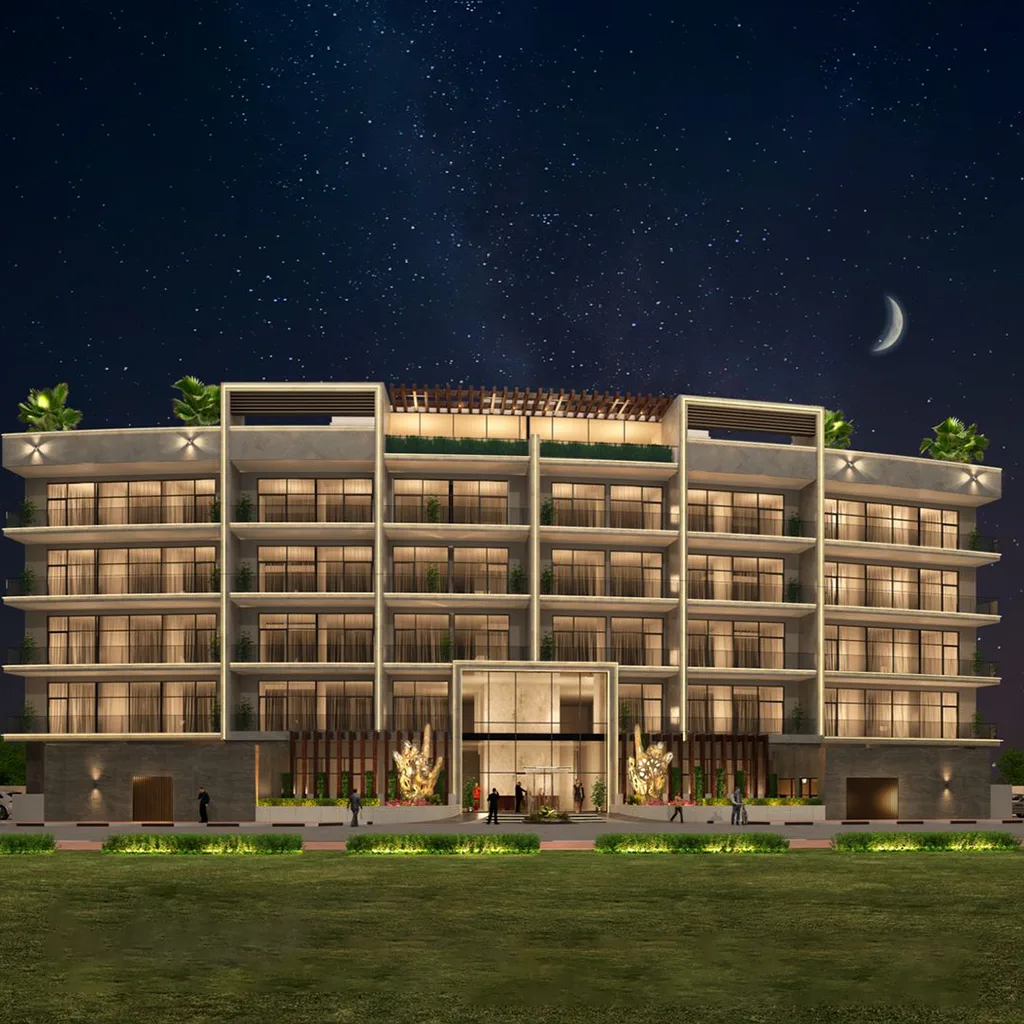 Night render of the full facade with entrance