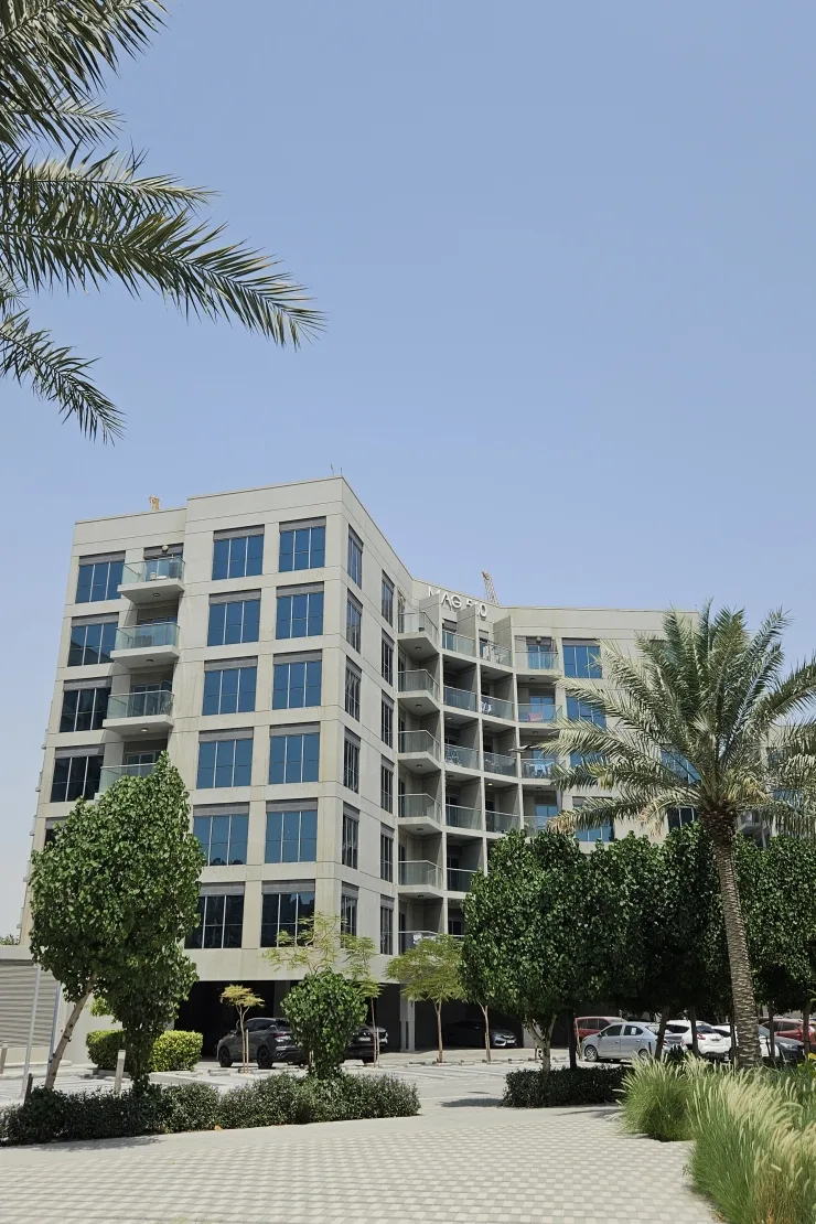 MAG 560 facade with balconies, seen from plaza