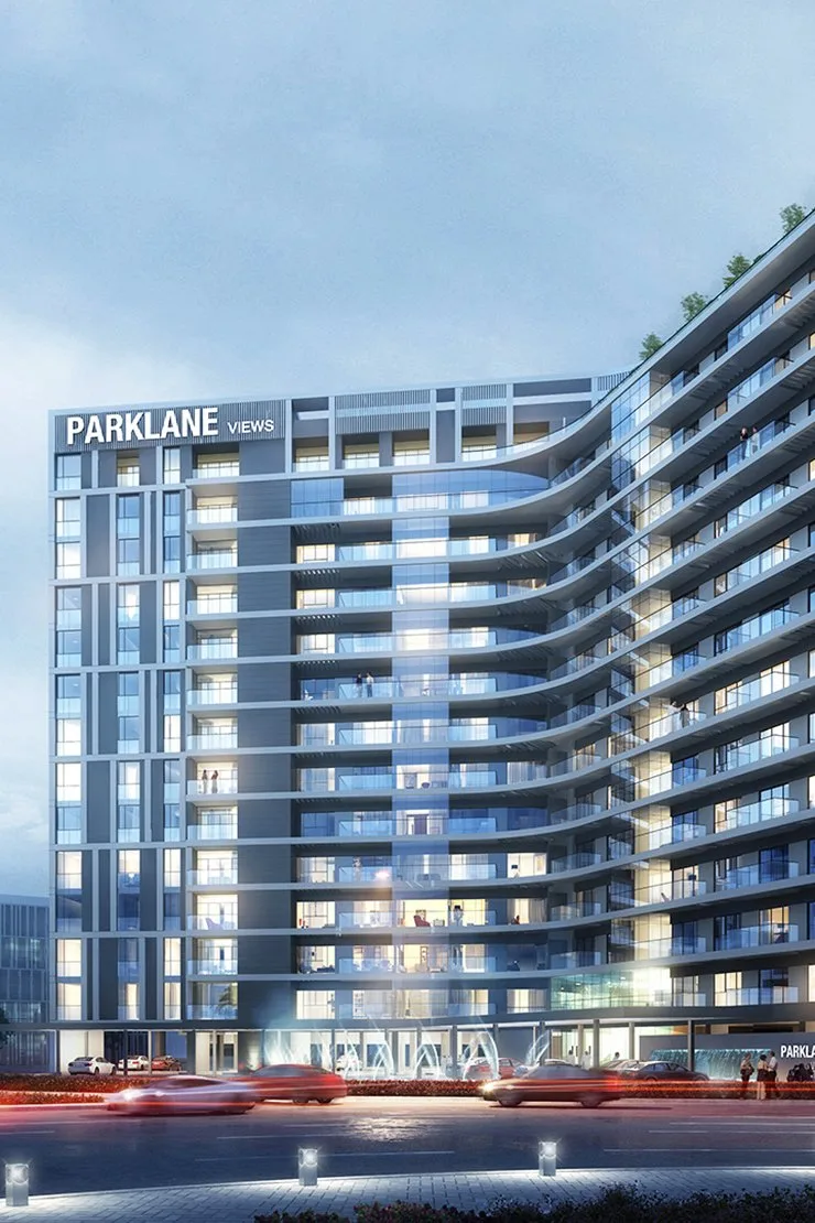 Curved Parklane Views facade at dusk, ground to roof
