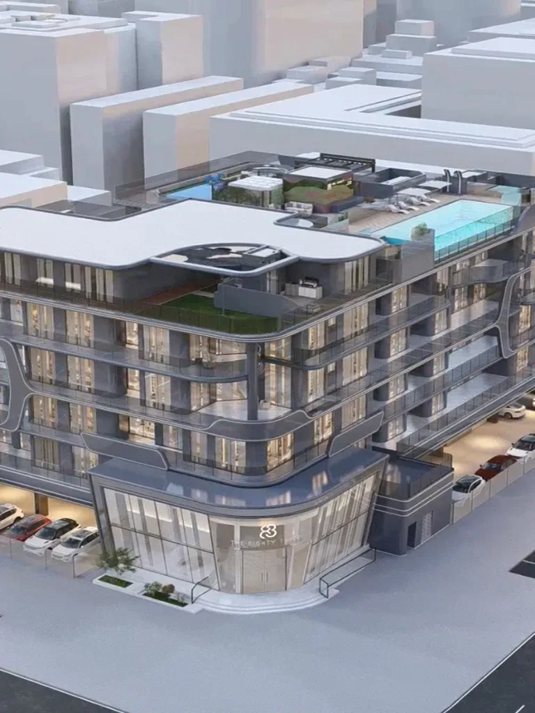 Corner view of the building with rooftop pool and entrance