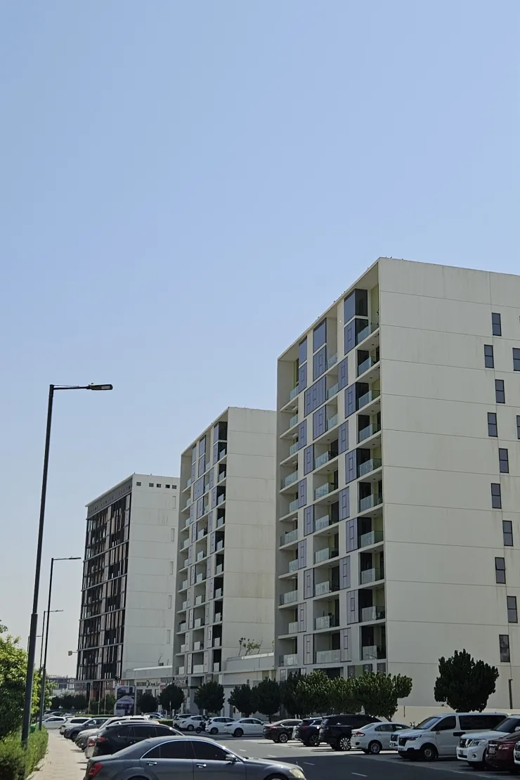 Project picture: The Pulse Residence Plaza. Side view of Pulse Residence buildings along the street