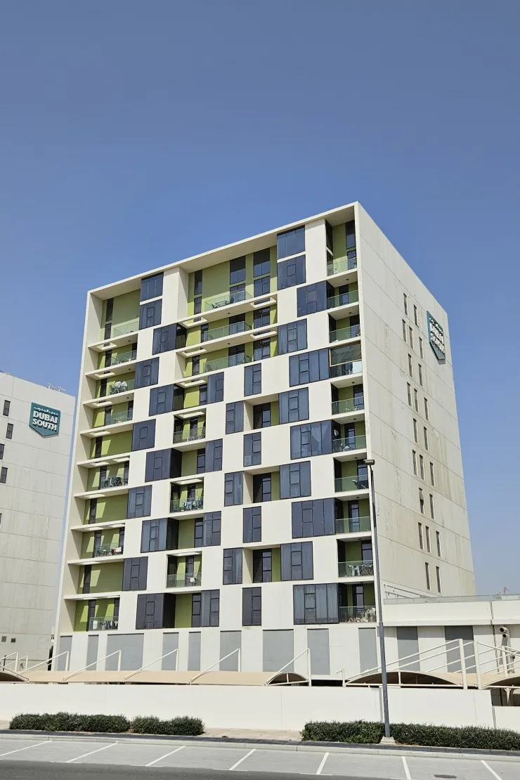 Green and white Pulse Residence Park block, full height