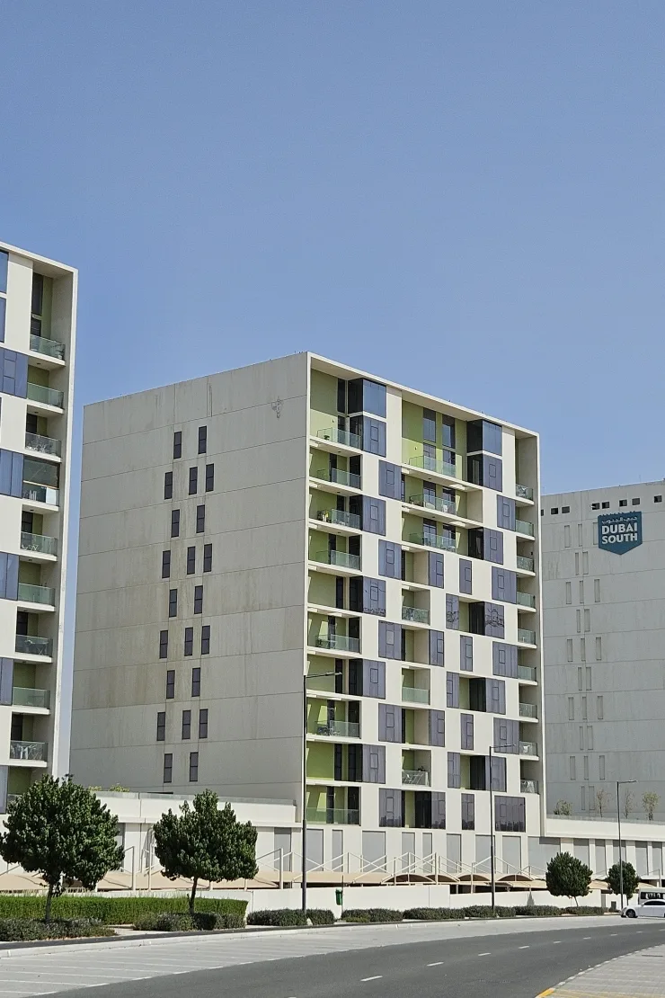 Green-balcony Pulse block with Dubai South signage