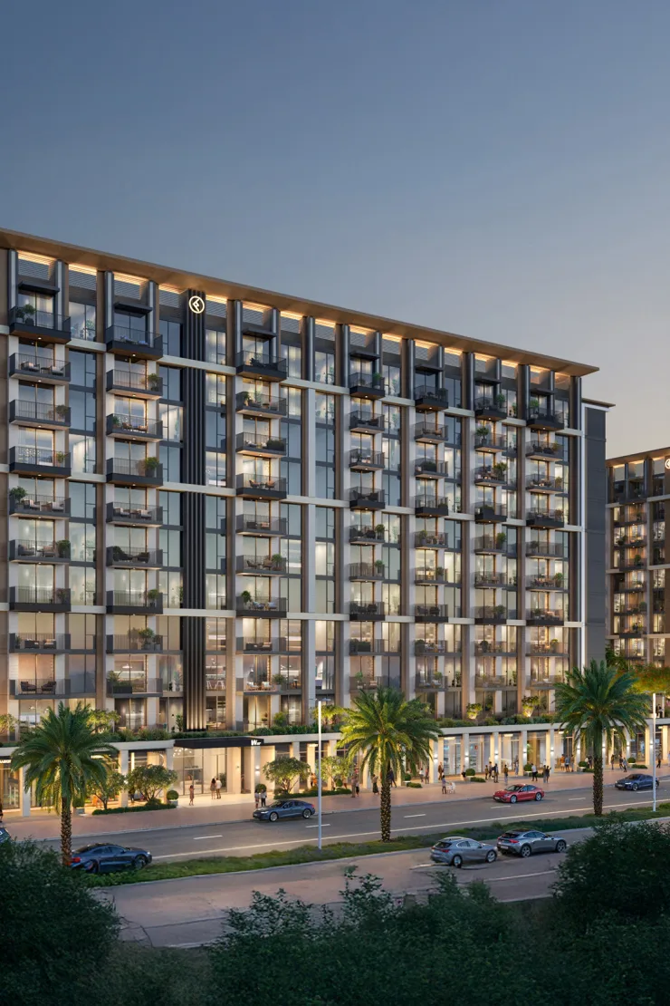 Dusk render of the full facade with street-level retail