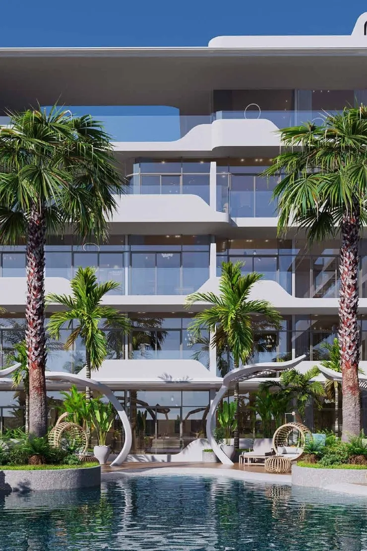Pool and palms in front of white curved facade