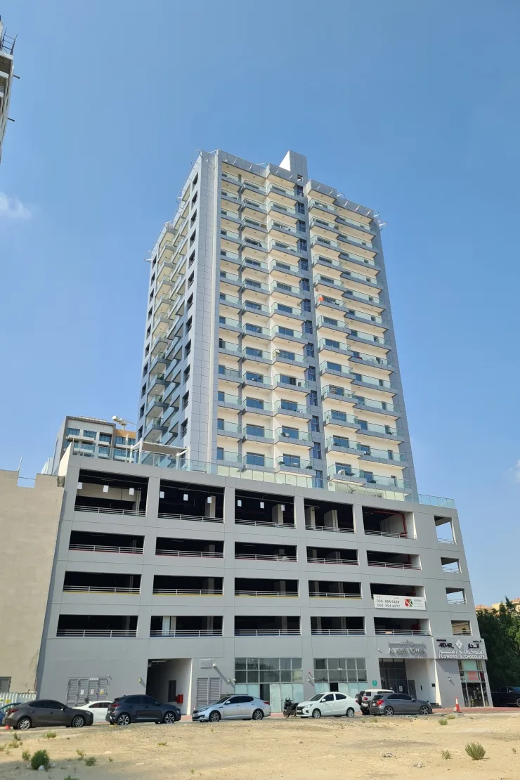 Full tower and podium seen from the street