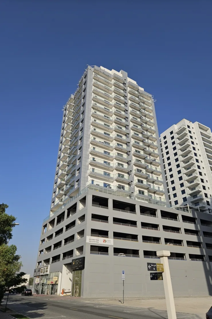 Tower and parking podium from low street angle