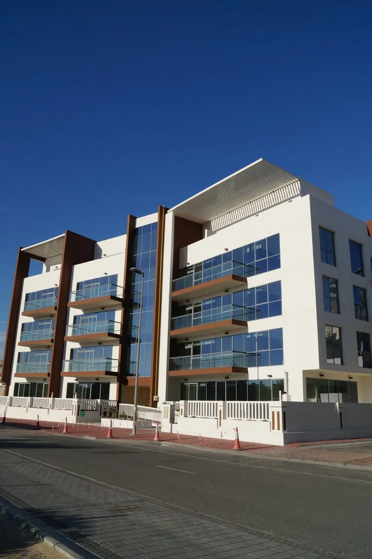 Corner view of the building under blue sky