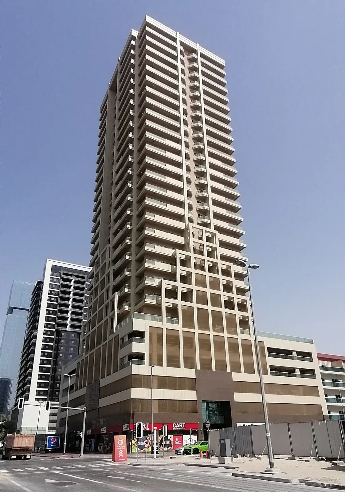 Street view of tower and retail podium
