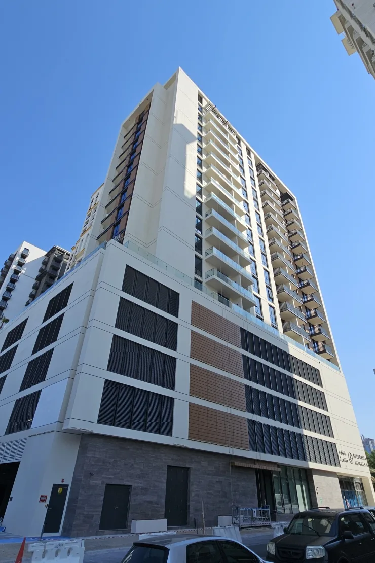 Tower and louvred podium seen from street level