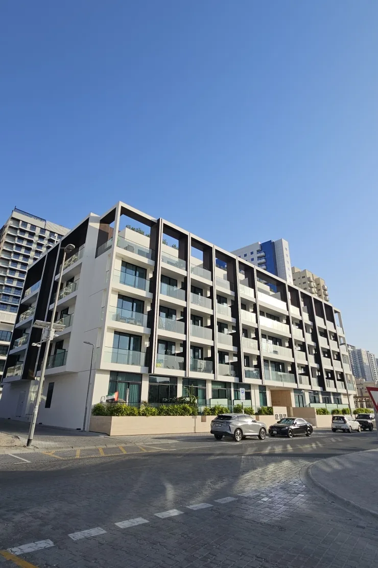 Corner view of the full mid-rise facade