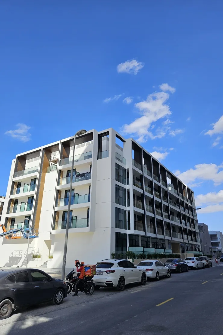 Corner view of white and black balcony facade