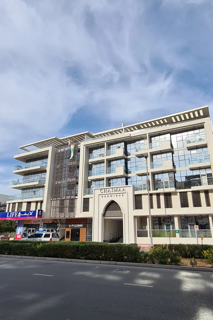 Front facade with Chaimaa Premiere signage and arched entrance