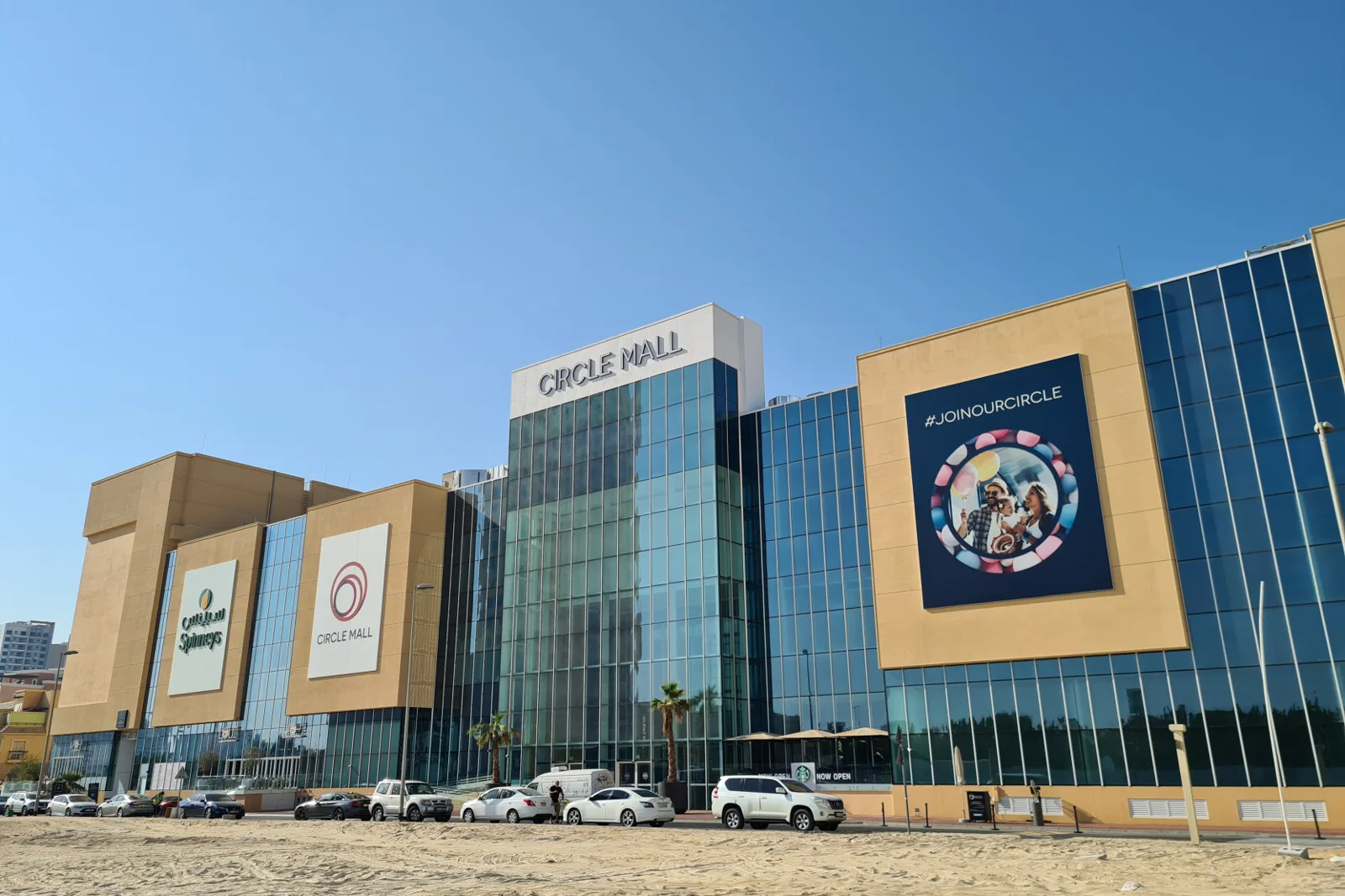 Circle Mall facade with glass tower and signage