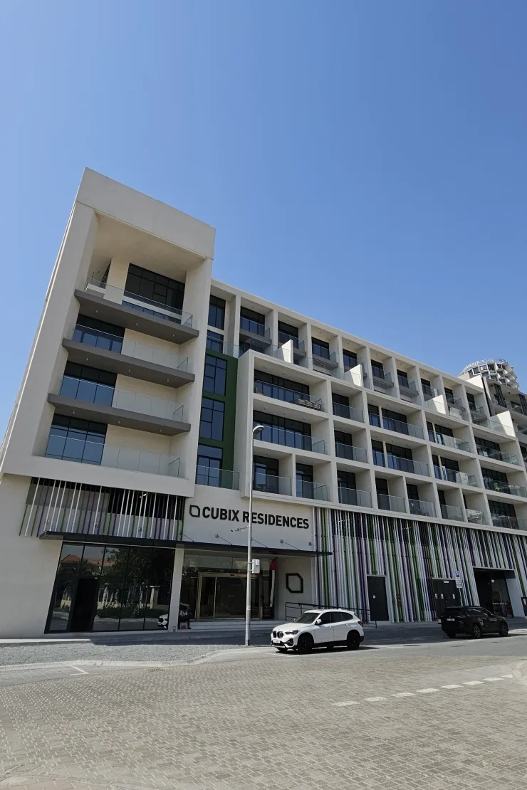 Completed Cubix Residences facade with signage from street