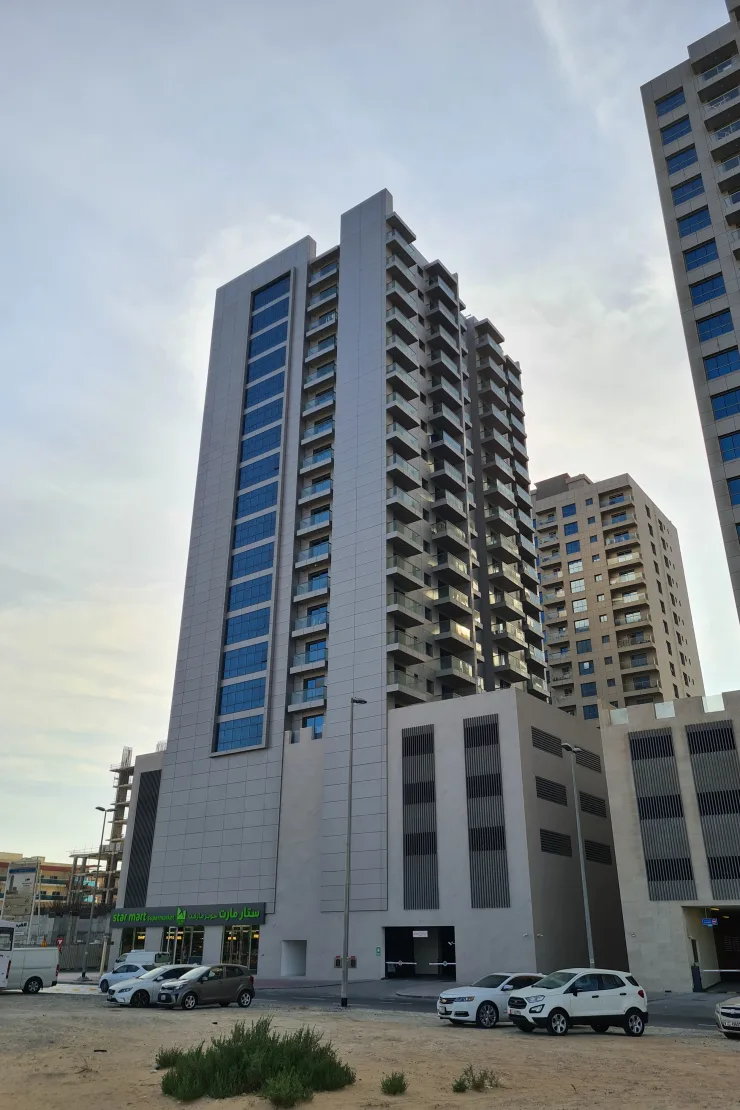 Completed tower from another angle, balconies and podium