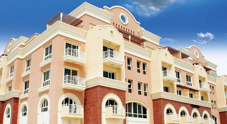 Upper facade with cream and pink tones, pergolas